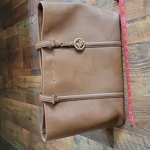 Micheal Kors bag in luggage